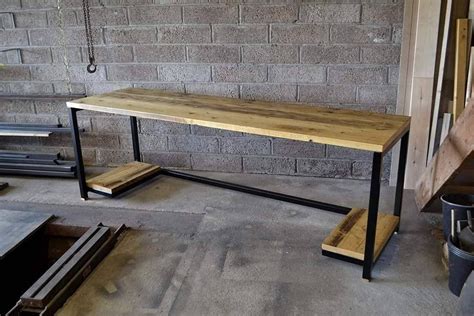 Here's a look at one of our handmade industrial desks that feature built in PC shelves at each ...