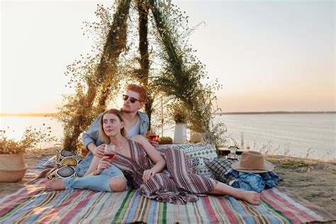 A Couple Having a Picnic Date at the Beach · Free Stock Photo