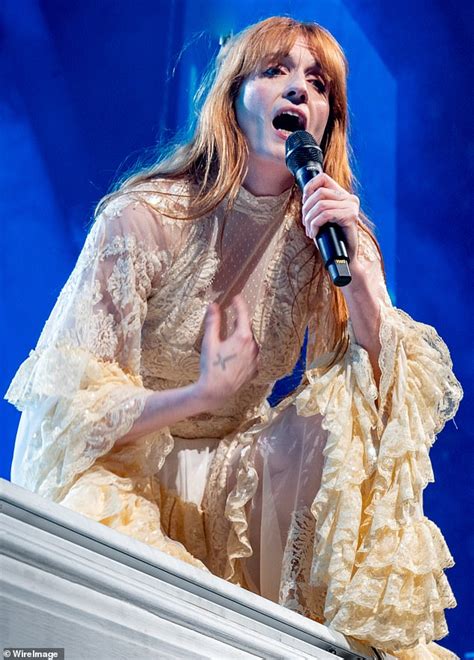 Florence Welch graces the stage in a lacy cream dress as she wows ...