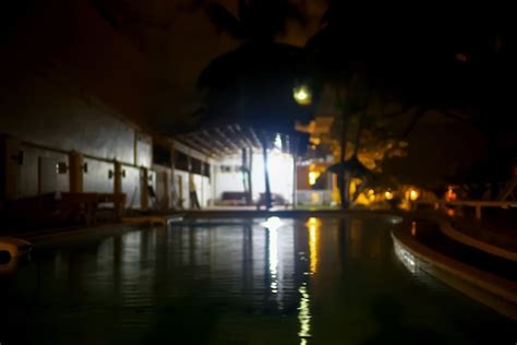 Premium Photo | Pool at the hotel at night