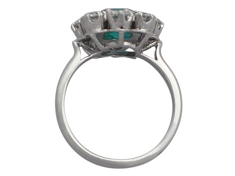 1.30Ct Emerald and 1.66Ct Diamond, 1k White Gold Cluster Ring - Vintage Circa 1950 at 1stdibs