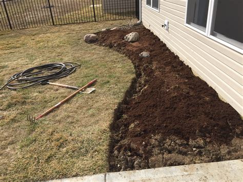 Amending Clay Soil with Upside Down Sod and Expanding the Backyard Bed ...