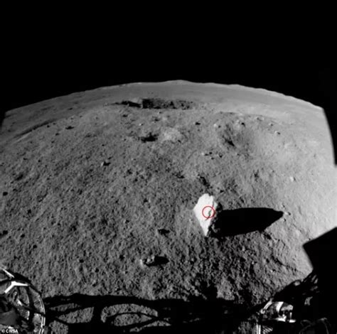 China's rover discovers elongated 'milestone' rock sticking out on the far side of the moon ...