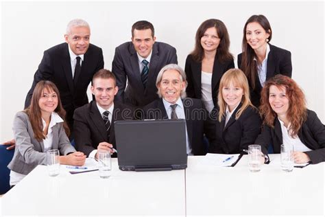 Businessman Showing on Laptop in Meeting Stock Photo - Image of happy, planning: 57197604