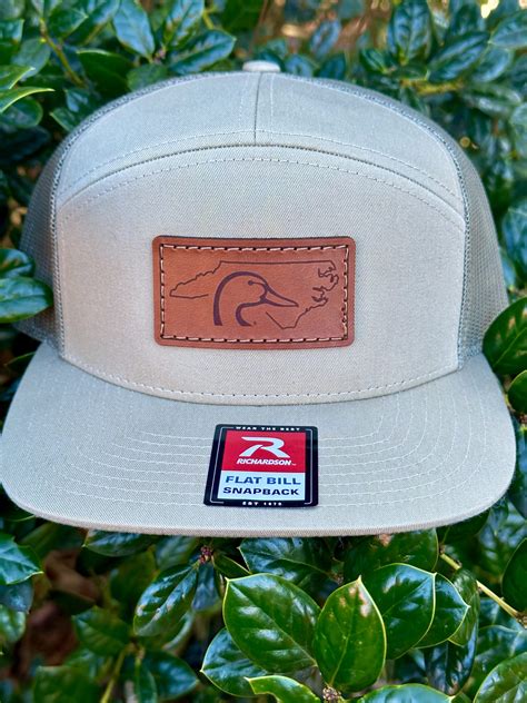 North Carolina Ducks Leather Patch 7 Panel Trucker Hat Pale Khaki/Loden – AG Outfitters NC
