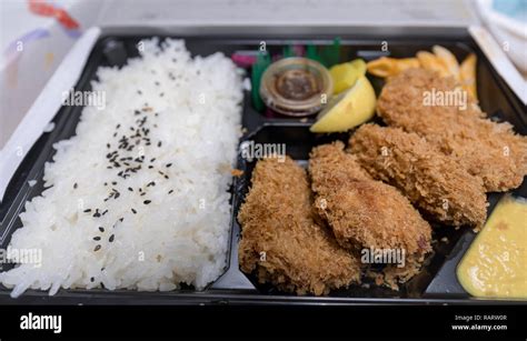 Tonkatsu Bento Served with Japanese Rice Wraped, Cut Tonkatsu (Deep ...