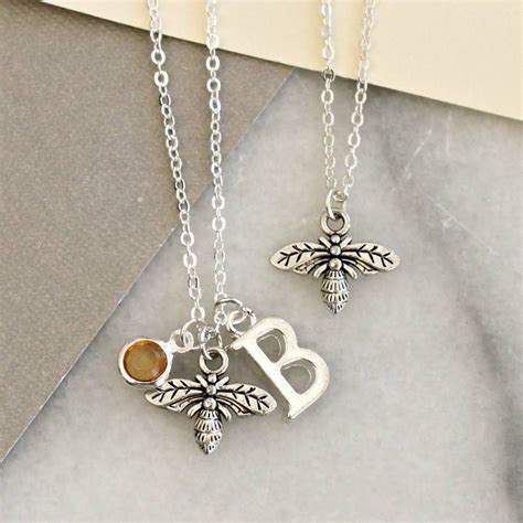 A beautiful bee charm necklace.Our charm necklaces can all be ...