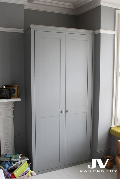 Grey alcove wardrobe with shaker doors and original picture rail | Alcove wardrobe, Fitted ...