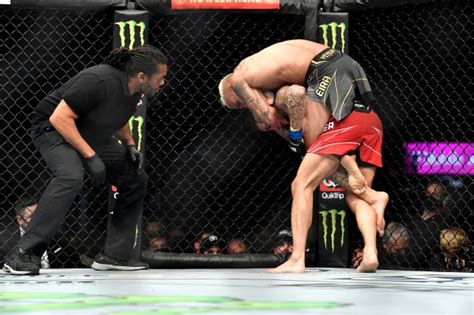 Charles Oliveira Submits Dustin Poirier In Wild UFC 269 Main Event