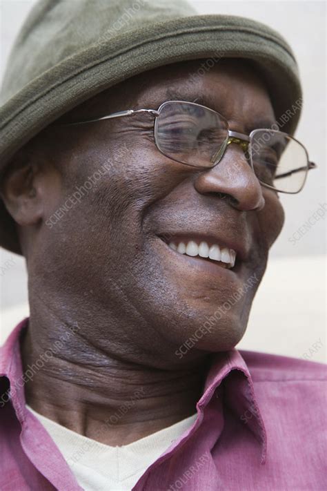 Elderly man smiling - Stock Image - C046/6099 - Science Photo Library