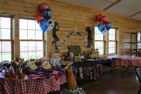 Western cowboy themed party first birthday one decorations rope sign smash cake dessert table ...