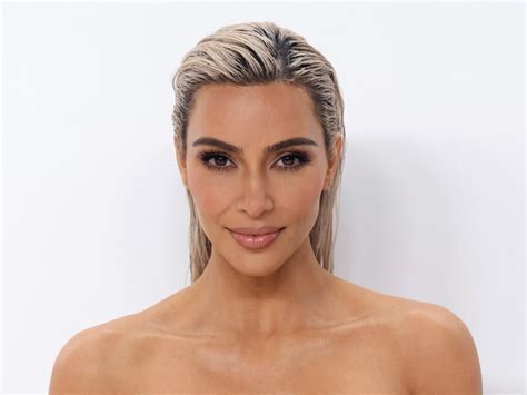 Kim Kardashian Announces SKIMS Swim While in a Sexy Gray Bikini: Photo