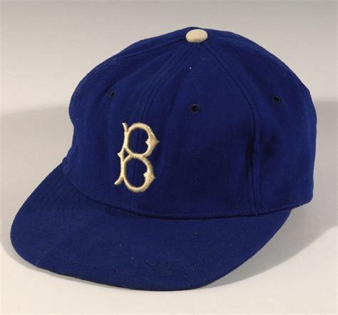 Game used Brooklyn Dodgers baseball cap. | This girl loves baseball