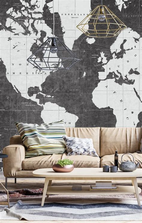 a living room filled with furniture and a large world map on the wall ...