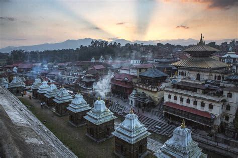Sunset and cremations at Pashupatinath Temple in Kathmandu, Nepal. stock photo