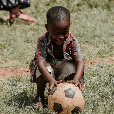 Children Playing Soccer In Africa