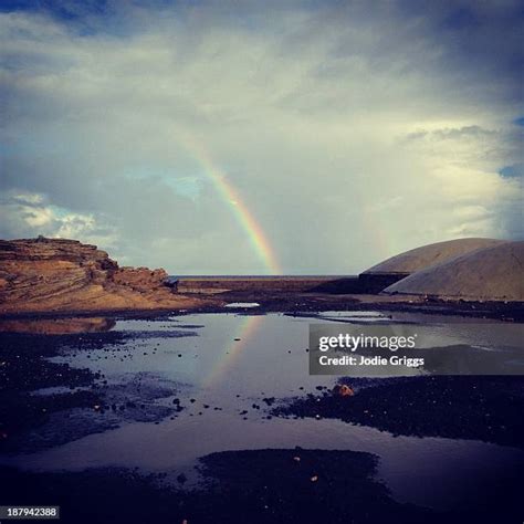 Rainbow Puddle Photos and Premium High Res Pictures - Getty Images