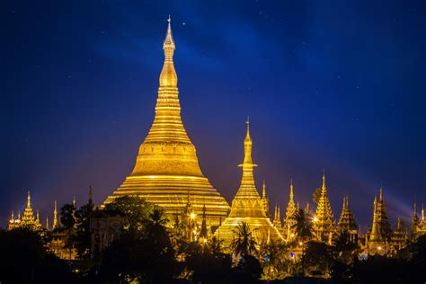 Shwedagon pagoda with blue night sky background in Yangon - LookOutPro