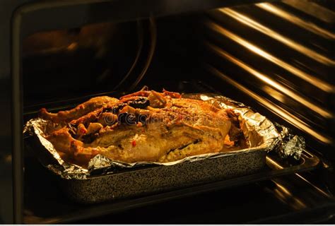 Roast Duck in the Oven Cooking in the Oven Stock Image - Image of baked ...