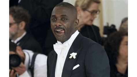 Idris Elba is doting dad - 8 Days