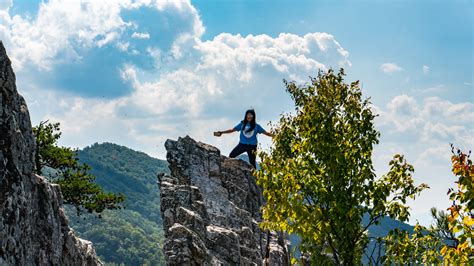 Climbing up to the top of Seneca Rocks - Hand in Hand Adventures