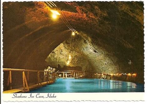 the inside of a tunnel with blue water