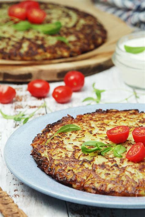 Rosti - Swiss Dish Made of Grated Potato Stock Image - Image of ...