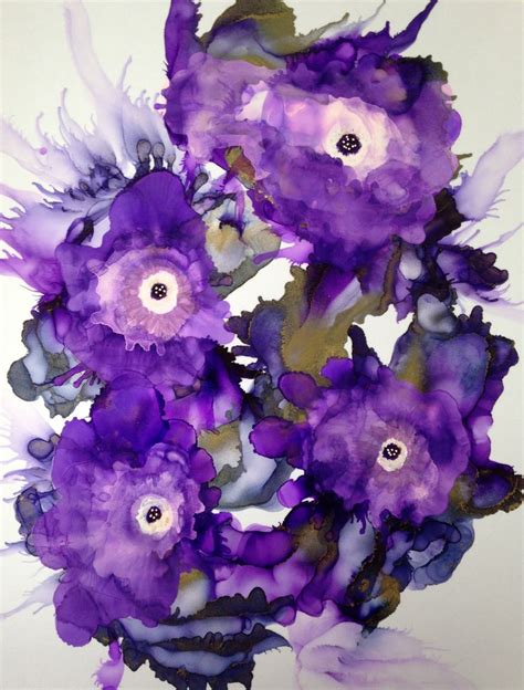 purple flowers in a vase on a white background