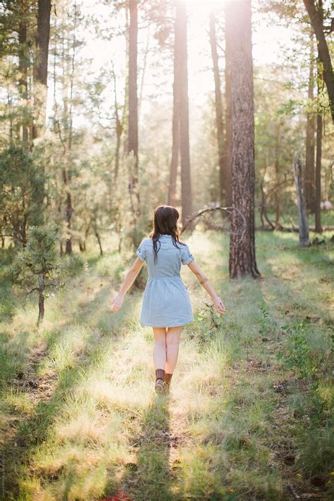 "Girl Walking In Forest" by Stocksy Contributor "Daniel Kim Photography" - Stocksy