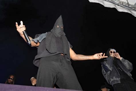 Kanye West shocks fans with KKK-style hood at 'Vultures' album release ...