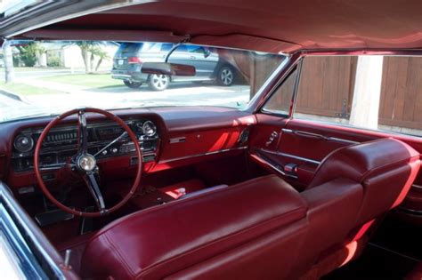 1964 Cadillac Coupe DeVille White Red Interior