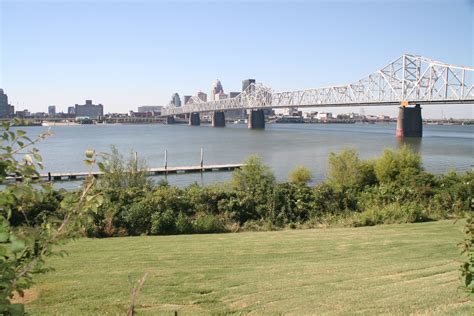 The crossing, probably by ferry between Jeffersonville, Indiana and Louisville, KY on the Ohio ...