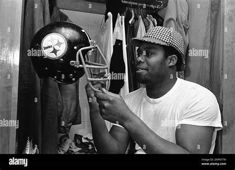 Pittsburgh Steelers defensive end Dwight White checks his helmet prior ...