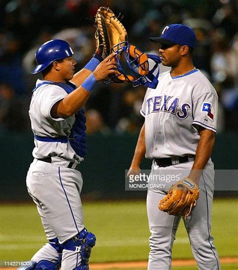 Texas Rangers relief pitcher Ugueth Urbina and catcher Einar Diaz ...