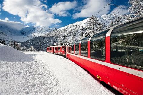 train through snow covered switzerland train | Truly Hand Picked