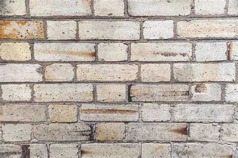 Tan brick wall stock photo. Image of stained, brick, texture - 69748796