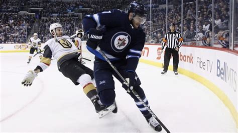 Jets sign forward Adam Lowry to three-year contract worth $8.75 million ...