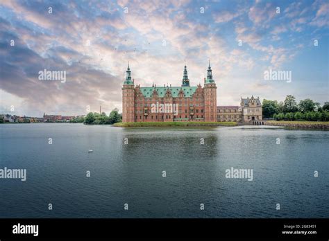 Frederiksborg Castle and Castle Lake at sunset - Hillerod, Denmark Stock Photo - Alamy