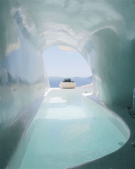 Pin by Brochu Walker on Neptune Water | Cave pool, Hotels in santorini greece, Santorini