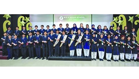 MES holds middle school investiture - Gulf Times