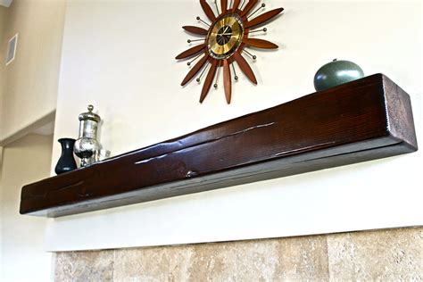 This wood beam mantel brings the organic look of reclaimed lumber to a contemporary space ...