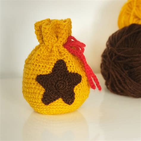 Ravelry: Animal crossing bell bag pattern by Meg Sheridan