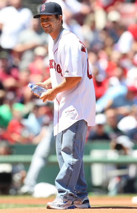 In July 2009, Mark Wahlberg wore his Boston Red Sox gear to throw out ...