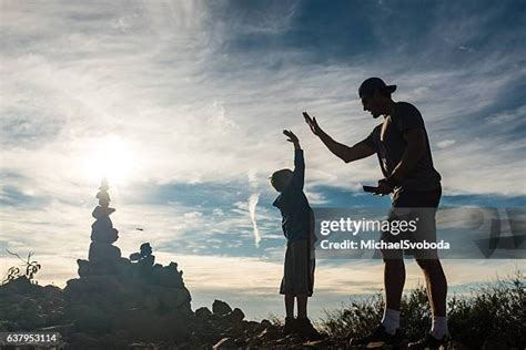 18 Kids High Five Silhouette Stock Photos, High-Res Pictures, and Images - Getty Images