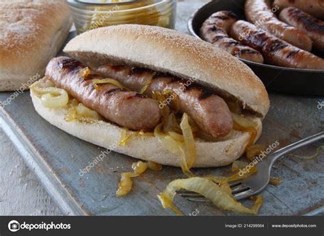 Sausage Buns Fried Onions Stock Photo by ©neillangan 214299564