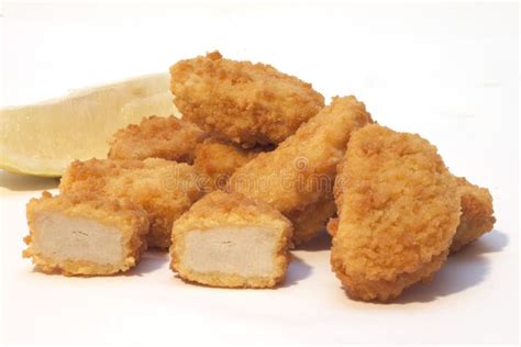 Breaded Chicken Nuggets with Packaging Stock Photo - Image of morsels ...