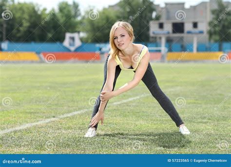 Fitness Woman Exercising Outdoors Stock Image - Image of stretching, shape: 57223565