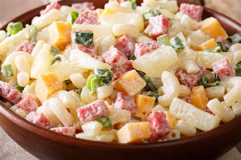 Delicious Hawaiian Salad with Pasta, Ham, Pineapple, Onion, Cheddar Cheese and Mayonnaise Close ...