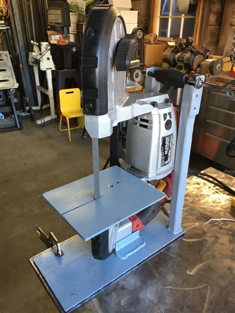 Nifty vertical table saw stand for you portable bandsaw that keeps your ...