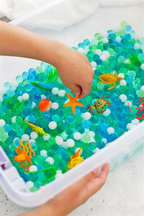 How to Make an Ocean Sensory Bin with Water Beads • One Lovely Life